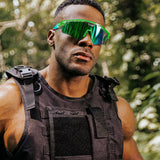 Lifestyle photo of LosReyes Prime Jurassic Pterodactyl sunglasses with a wraparound green and blue frame, mirrored shield lens, and aerodynamic fit. Designed for outdoor performance, high-speed training, and UV400 protection.