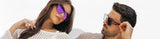 Two people wearing LosReyes sunglasses with a plain background