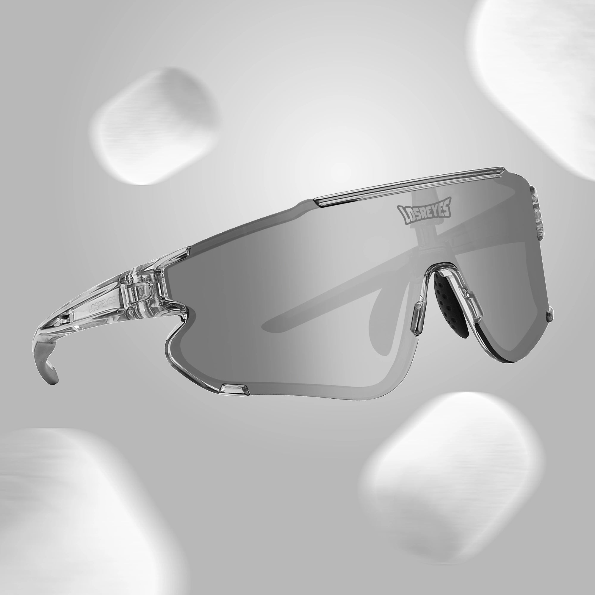 Losreyes Elevate sunglasses in Marshmallow white, soft background with floating marshmallows.