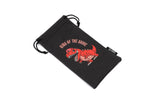 T-Rex character with “King of the Game” text on LosReyes Jurassic Series sunglasses pouch