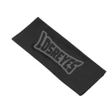 Flat lay of LosReyes black microfiber lens cleaning cloth featuring embossed crown-and-shield logo, perfect for polishing mirrored wraparound sunglasses, sports eyewear, polarized lenses, and performance optics.