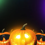 Carved pumpkin with glowing eyes on a dark background LosReyes buy one get one free offer Halloween