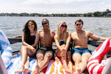 Group of people wearing Omega sunglasses while spending a sunny day on the lake.