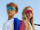 Youth baseball and softball players wearing LosReyes Candy  baseball sunglasses