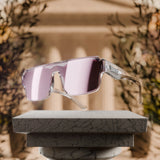 Athena polarized premium-acetate sunglasses with sweat-resistant and scratch-resistant lenses displayed in a clean, classical setting.