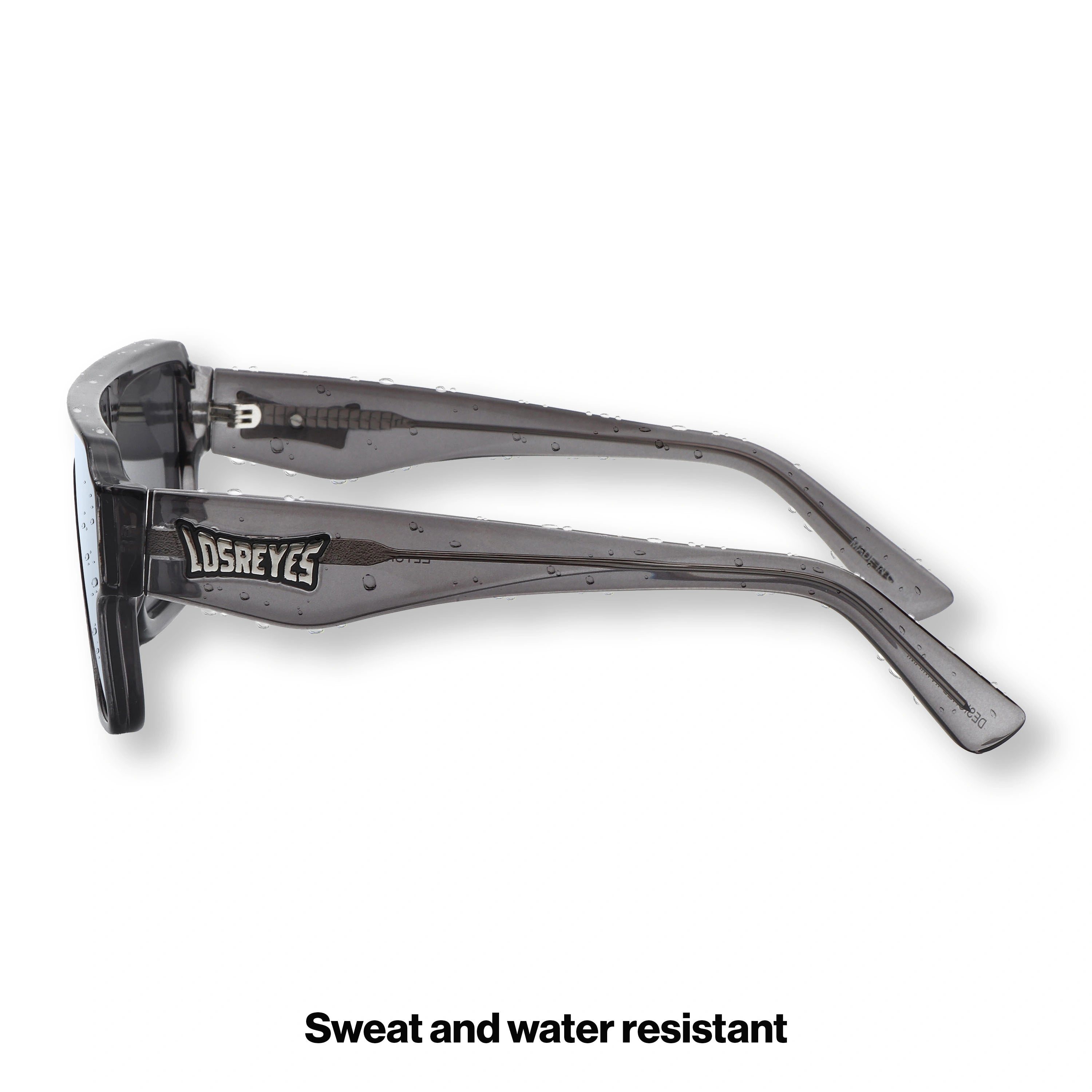 Side profile of LosReyes Omega Hades sunglasses showing black translucent temples, aerodynamic fit, and shield-style mirrored lens ideal for high-speed motion and sun coverage.