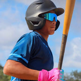 Young baseball player in helmet wearing blue-mirror blue raz LosReyes sunglasses