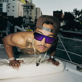 Discover the LosReyes Zeus sunglasses in a bold yacht-deck lifestyle shot. Ultra-polarized lenses, elite durability, and a luxury streetwear aesthetic designed for all-day performance.