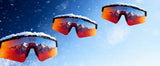 Three pairs of polarized sunglasses with mountainous landscape lenses against a snowy background LosReye, best gifts under 59$