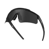 Angled front shot highlighting black polarized lenses and matte black TR90 build with curved wrap fit.