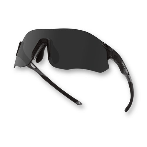 Angled view of EDGE Shadow running sunglasses with dark shield lens designed for focus and motion
