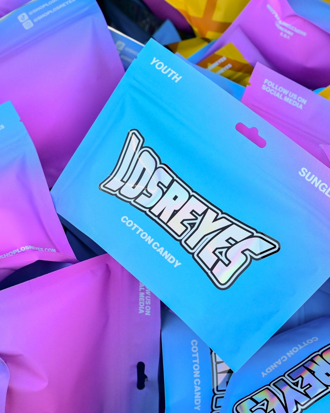 LosReyes Apparel Candy Collection cotton candy sunglasses packaging in blue and purple, youth sports lifestyle brand, shoplosreyes.com