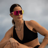 LosReyes Elevate Bubble Gum pink mirrored sport sunglasses — bold reflective style for running, cycling, and gym sessions.