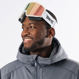 Adult wearing LosReyes Everest Cherry Blossom snow goggles in studio