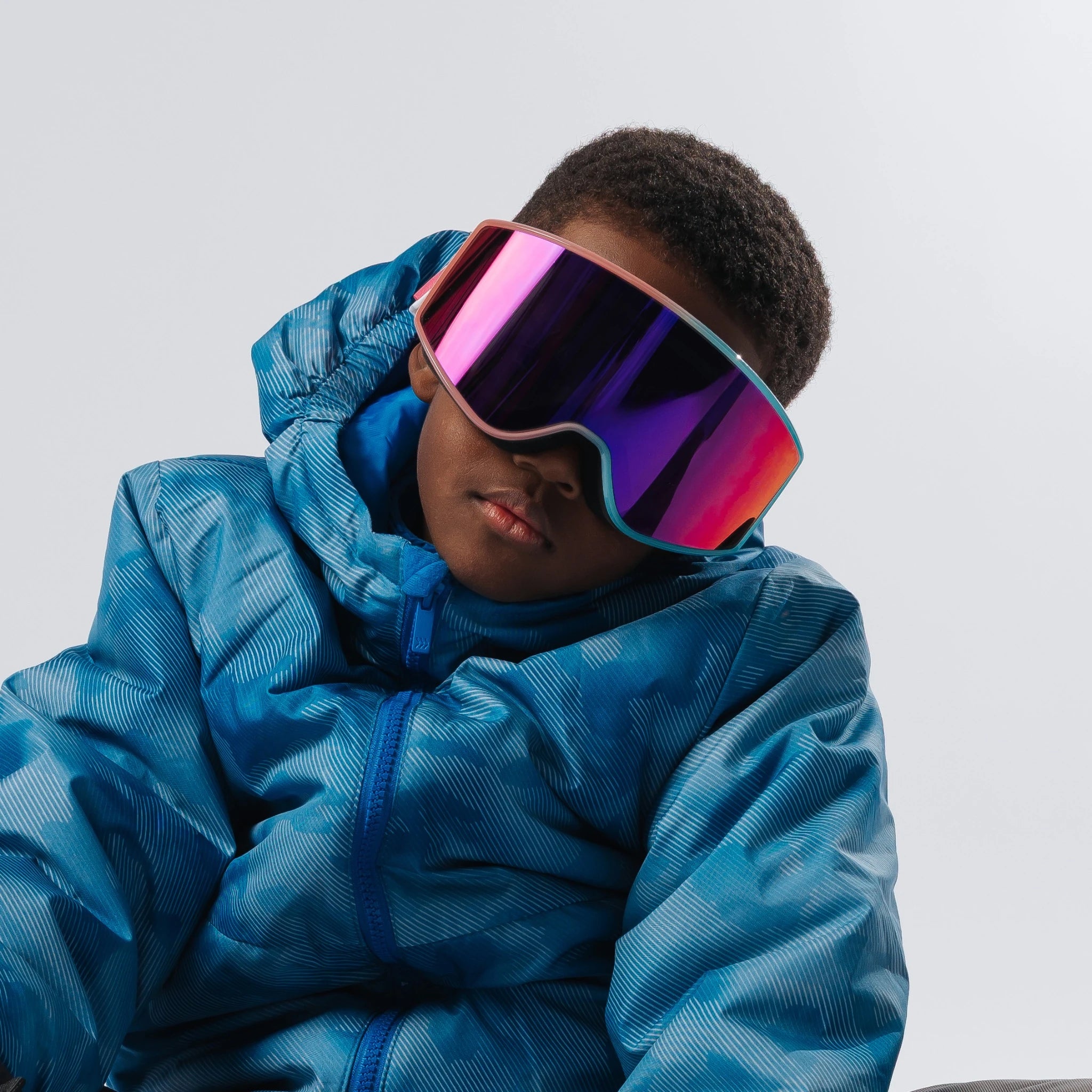 Child wearing LosReyes Everest Cotton Candy snow goggles in studio