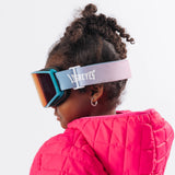 Child wearing LosReyes Everest Cotton Candy snow goggles side profile