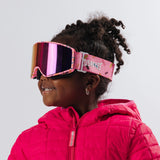 Child wearing LosReyes Everest Cream snow goggles side profile