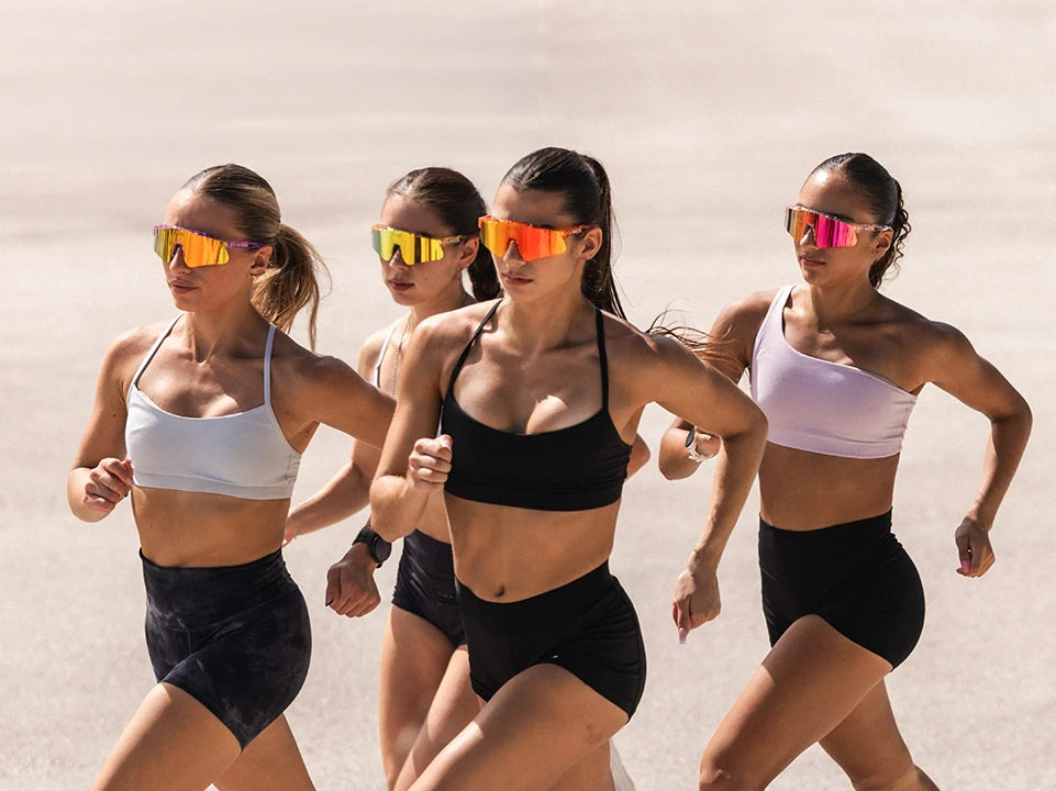 Women running in mirrored fitness shield sunglasses from LosReyes
