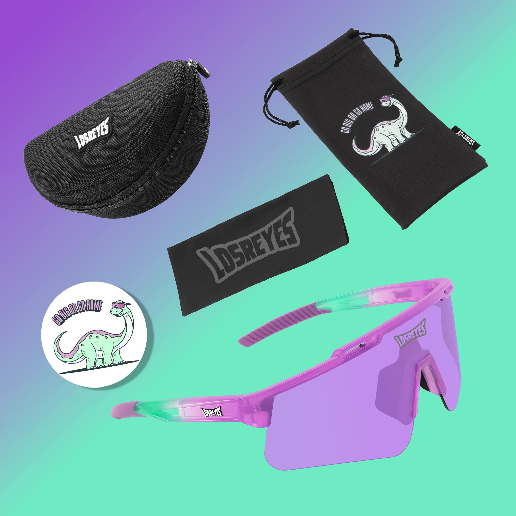 Jurassic Pro Pack by LosReyes, includes purple-green sporty sunglasses and dino-themed pouch with “Go Big or Go Home” design—perfect for young athletes.