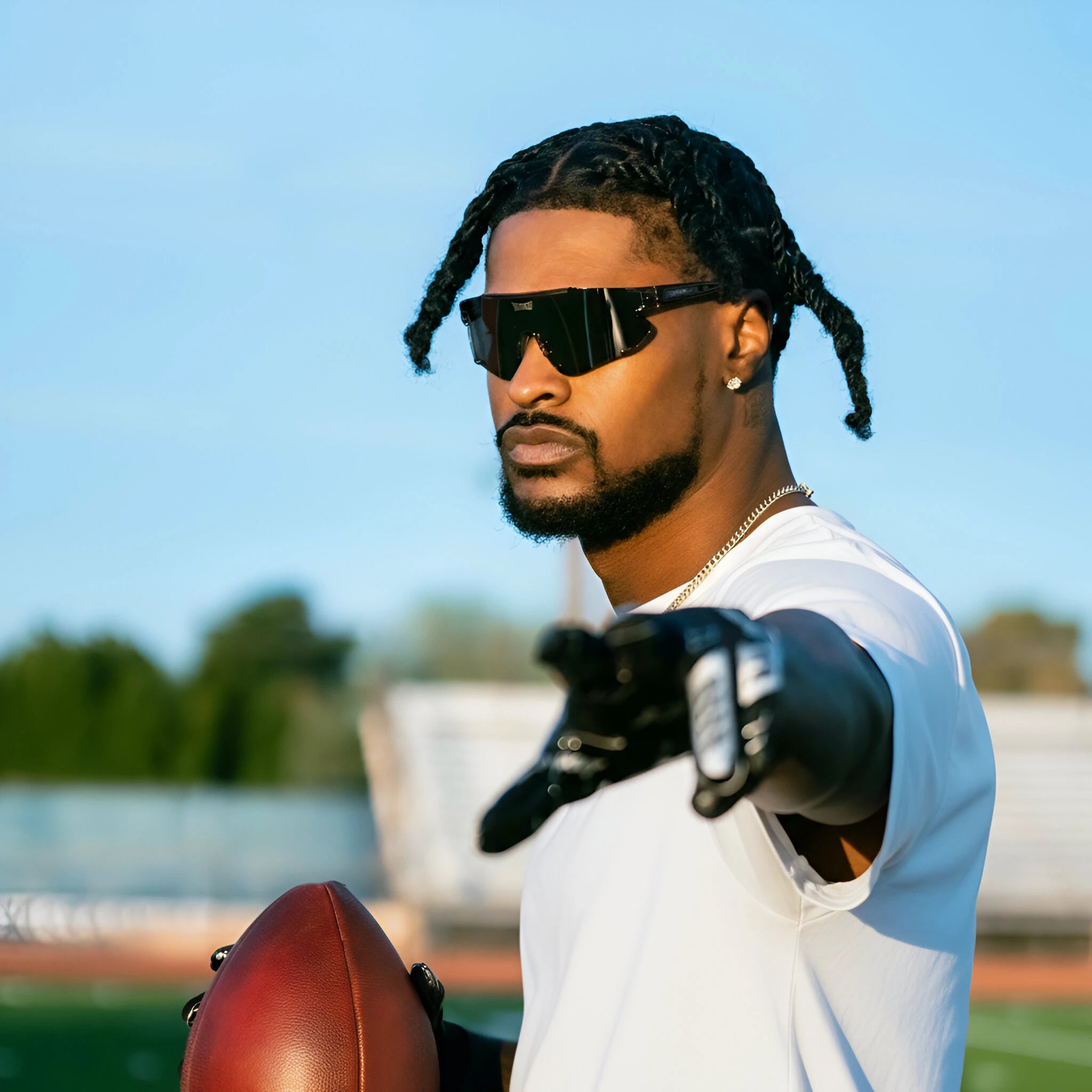 Football player Ross500 in LosReyes Marshmallow Elevate sunglasses, white frame and rainbow mirrored lens for elite athletic vision.