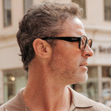 Man wearing LosReyes Opus Positano black frame sunglasses with orange lenses – premium fashion eyewear