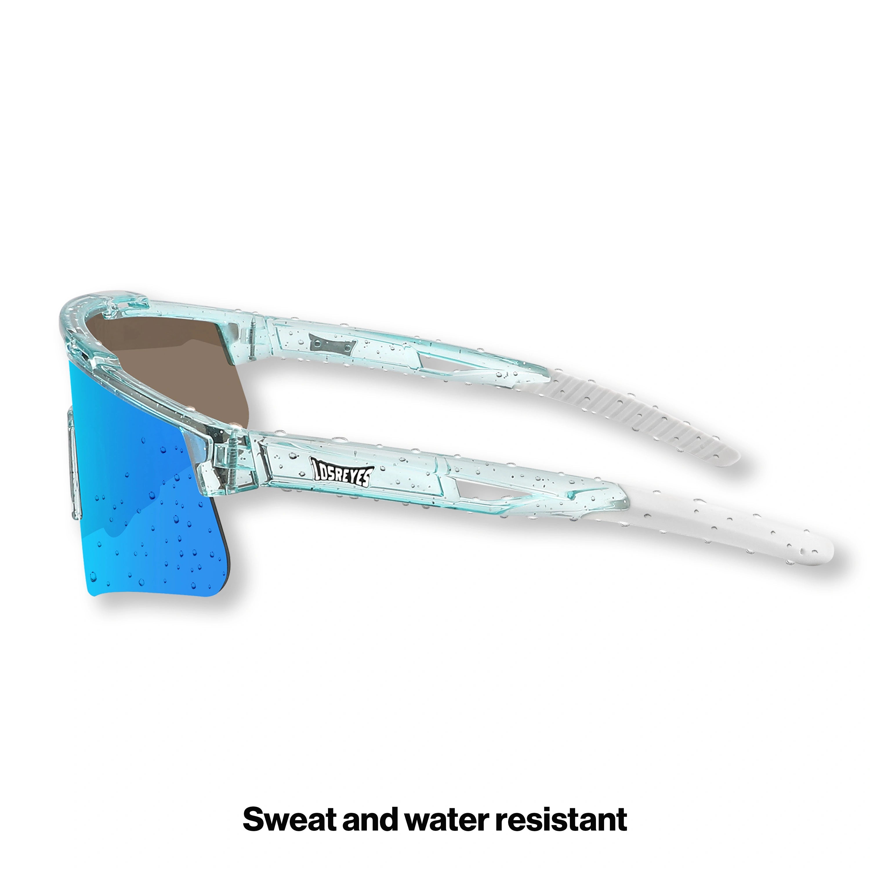 Side studio view of LosReyes Prime Galaxy Uranus blue athletic sunglasses featuring lightweight transparent blue speckled frame, white temples, and anti-slip ear grips for high-motion wear.