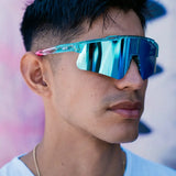 LosReyes Prime Galaxy Vice sunglasses with reflective blue shield lenses worn by athlete, perfect for baseball, training, and outdoor performance.