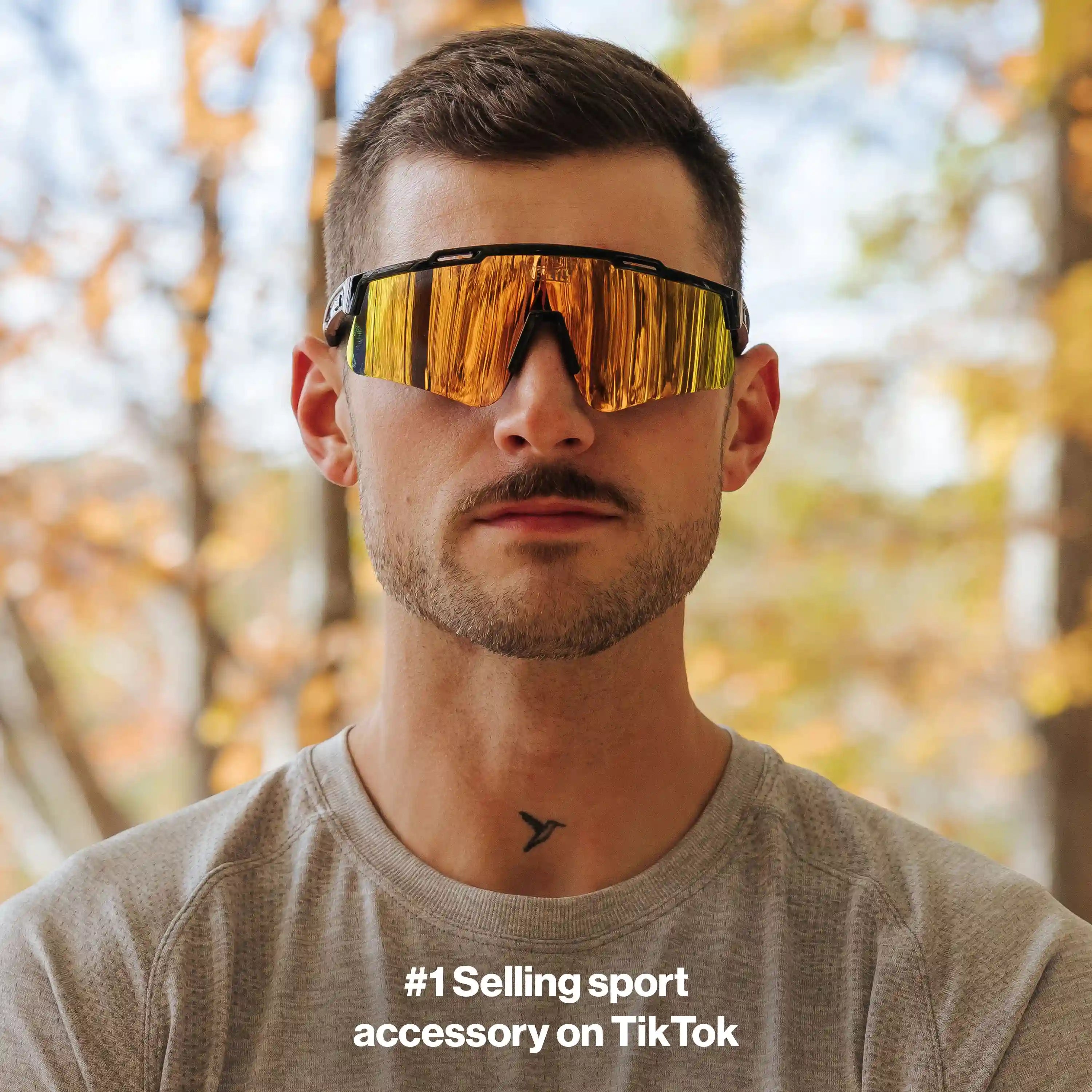 Man wearing LosReyes PRIME Polarized sunglasses with black frame and orange mirror lens, front view outdoors, mens polarized sport sunglasses