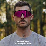 Man wearing LosReyes PRIME Polarized sunglasses with black frame and pink mirror lens, front view outdoors, mens polarized sport sunglasses