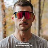 Man wearing LosReyes PRIME Polarized sunglasses with black frame and red mirror lens, front view outdoors, mens polarized outdoor sunglasses