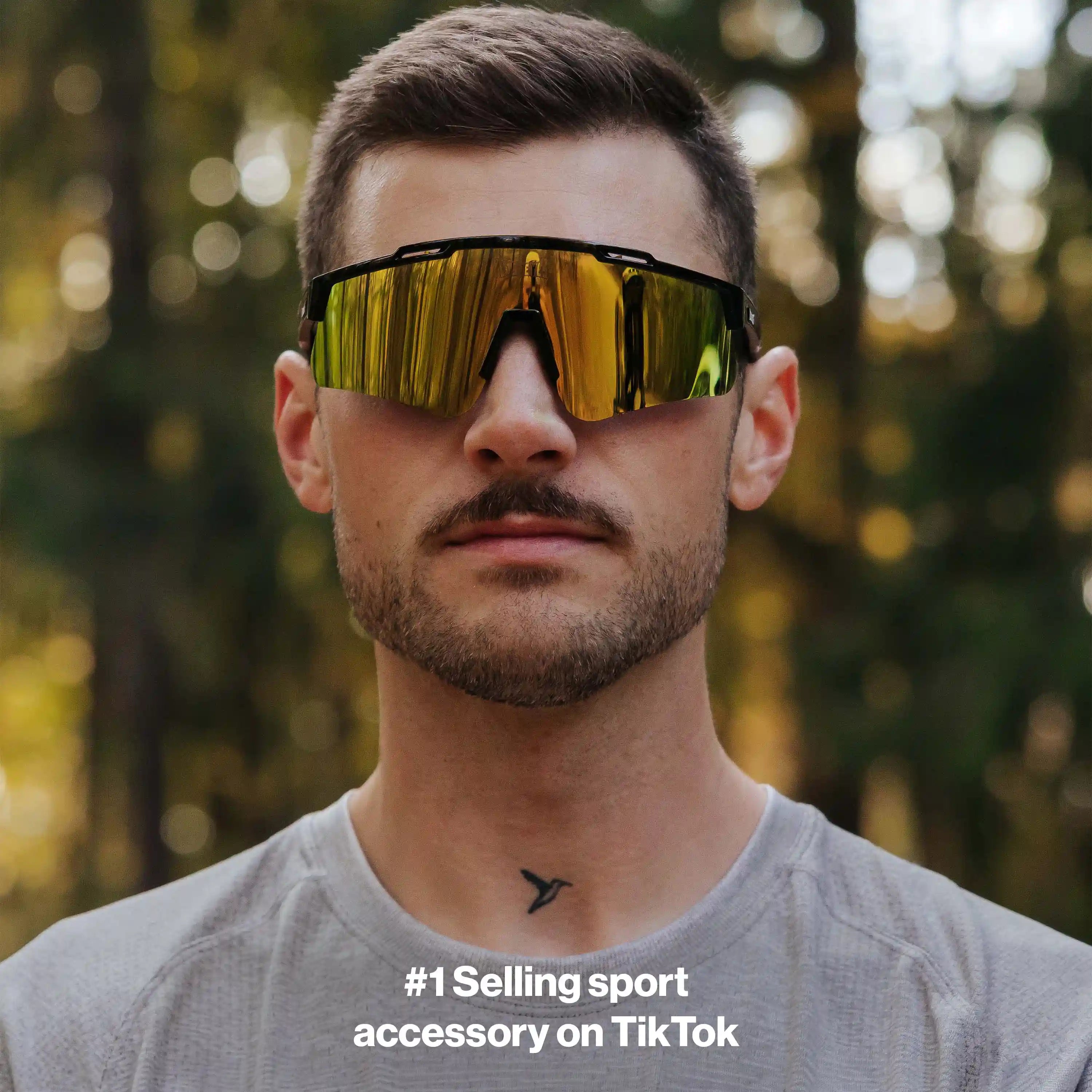 Man wearing LosReyes PRIME Polarized sunglasses with black frame and yellow mirror lens, front view outdoors, mens polarized sport sunglasses