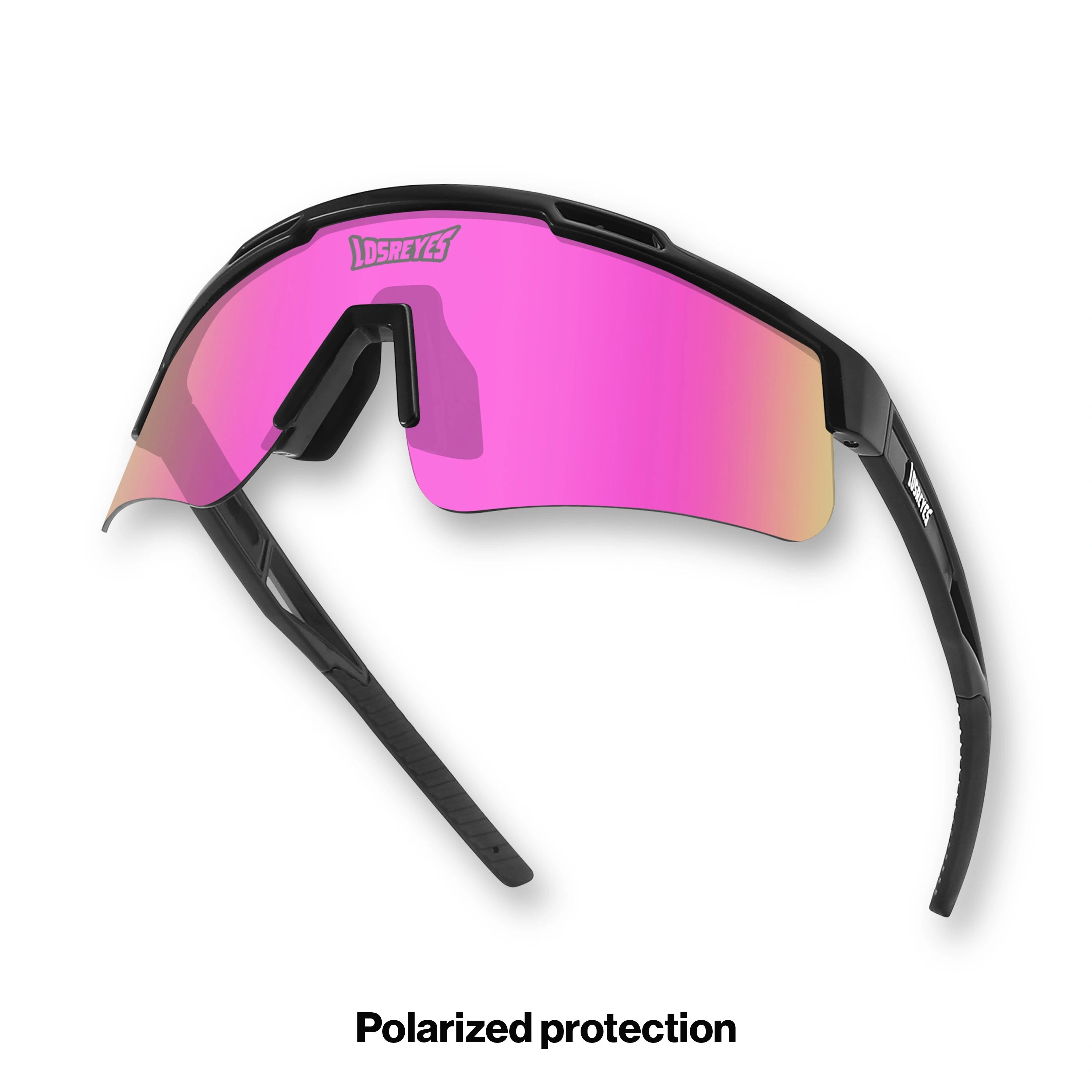 Hero angle of LosReyes Prime Polarized Pink wraparound shield sunglasses with bold pink mirrored lens, low-profile sport hinges, and UV-blocking polarized optics ideal for speed-based field sports and motion-heavy outdoor activity.