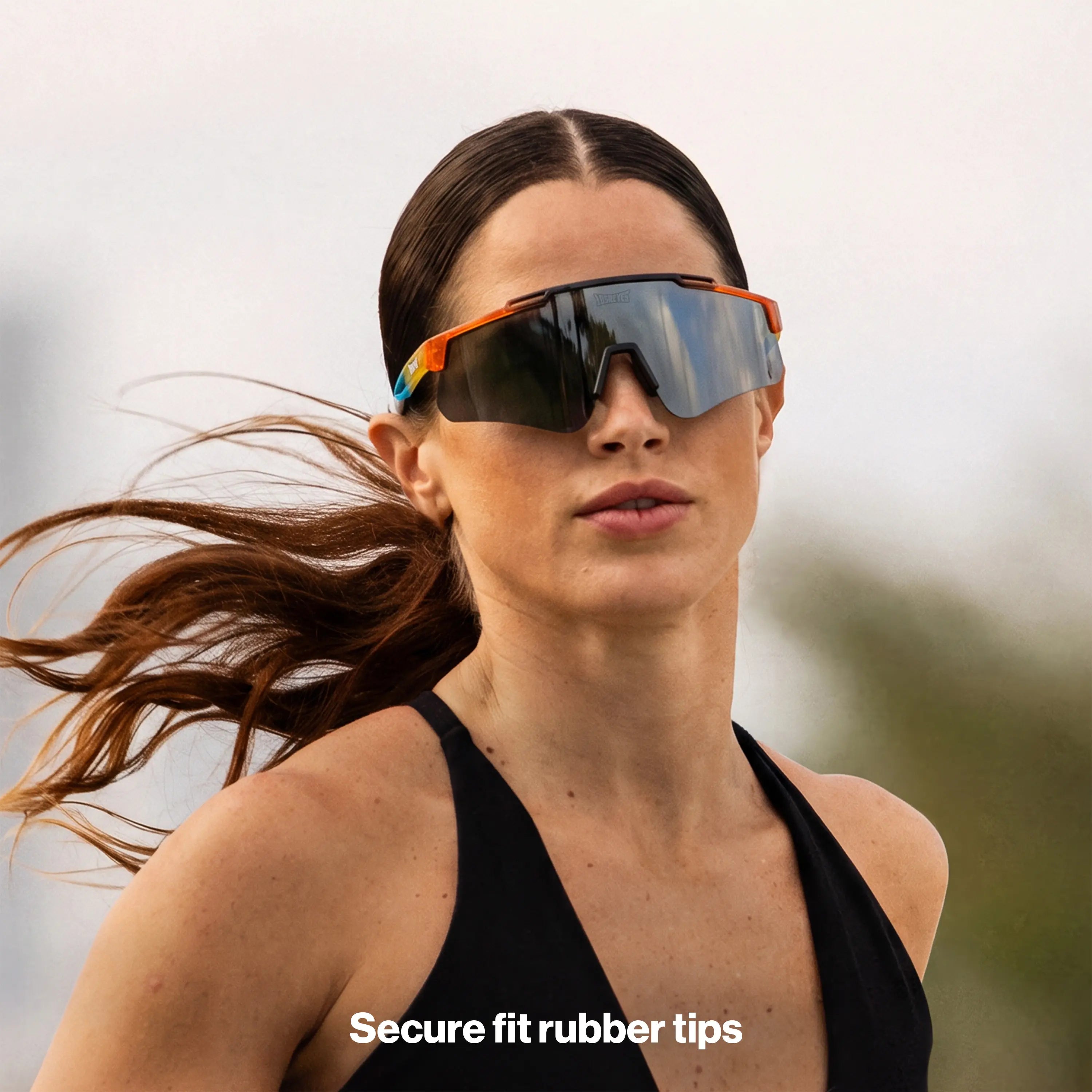Woman running outdoors in LosReyes Prime Summer Drop limited edition sunglasses, sunset gradient frame