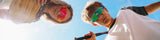LosReyes Prime Youth Candy Collection "Cream Blue" and "Cream Pink" youth sunglasses with UV400 protection on baseball fiel