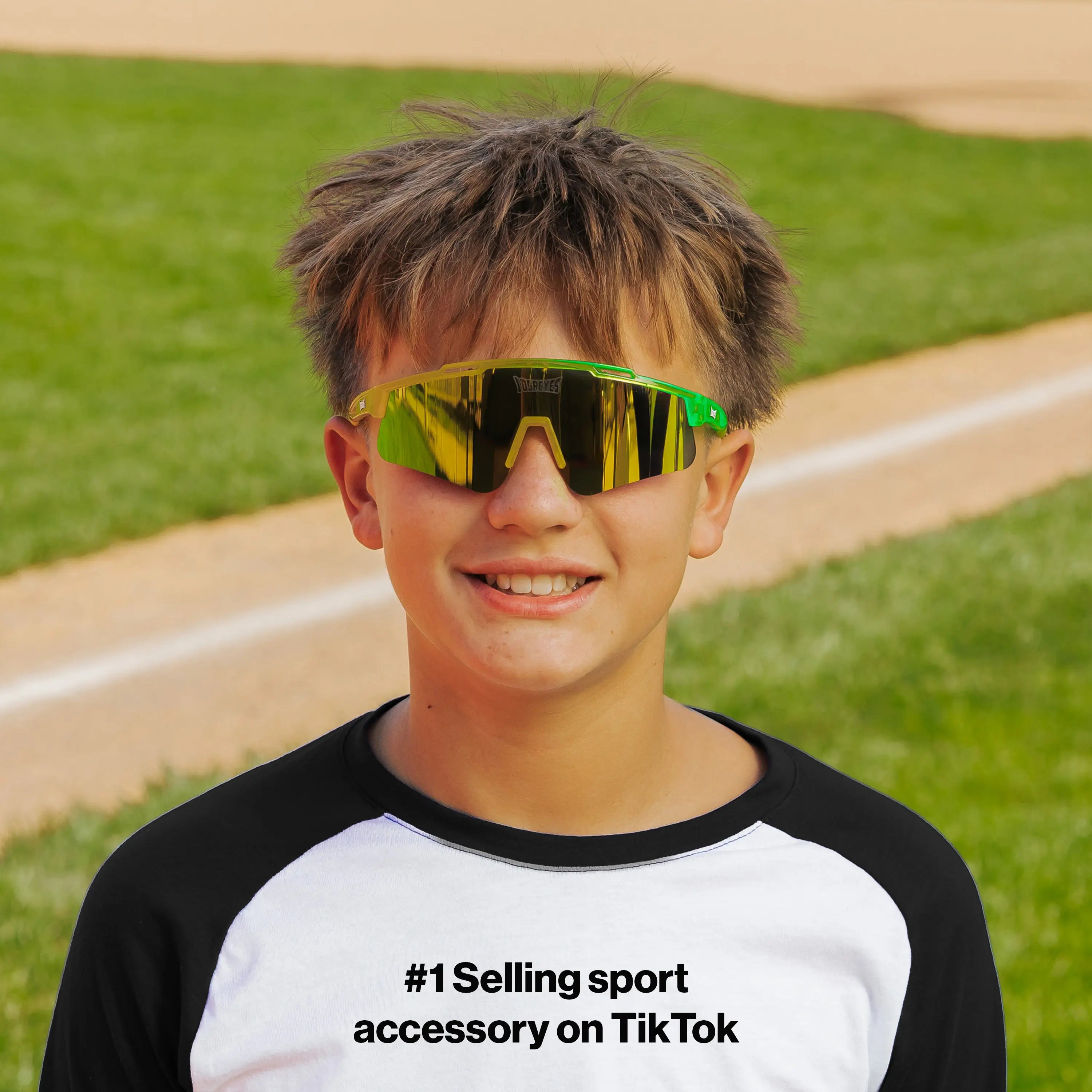 LosReyes PrimeYouth Candy Collection "Banana" youth sunglasses with UV400 protection on baseball field
