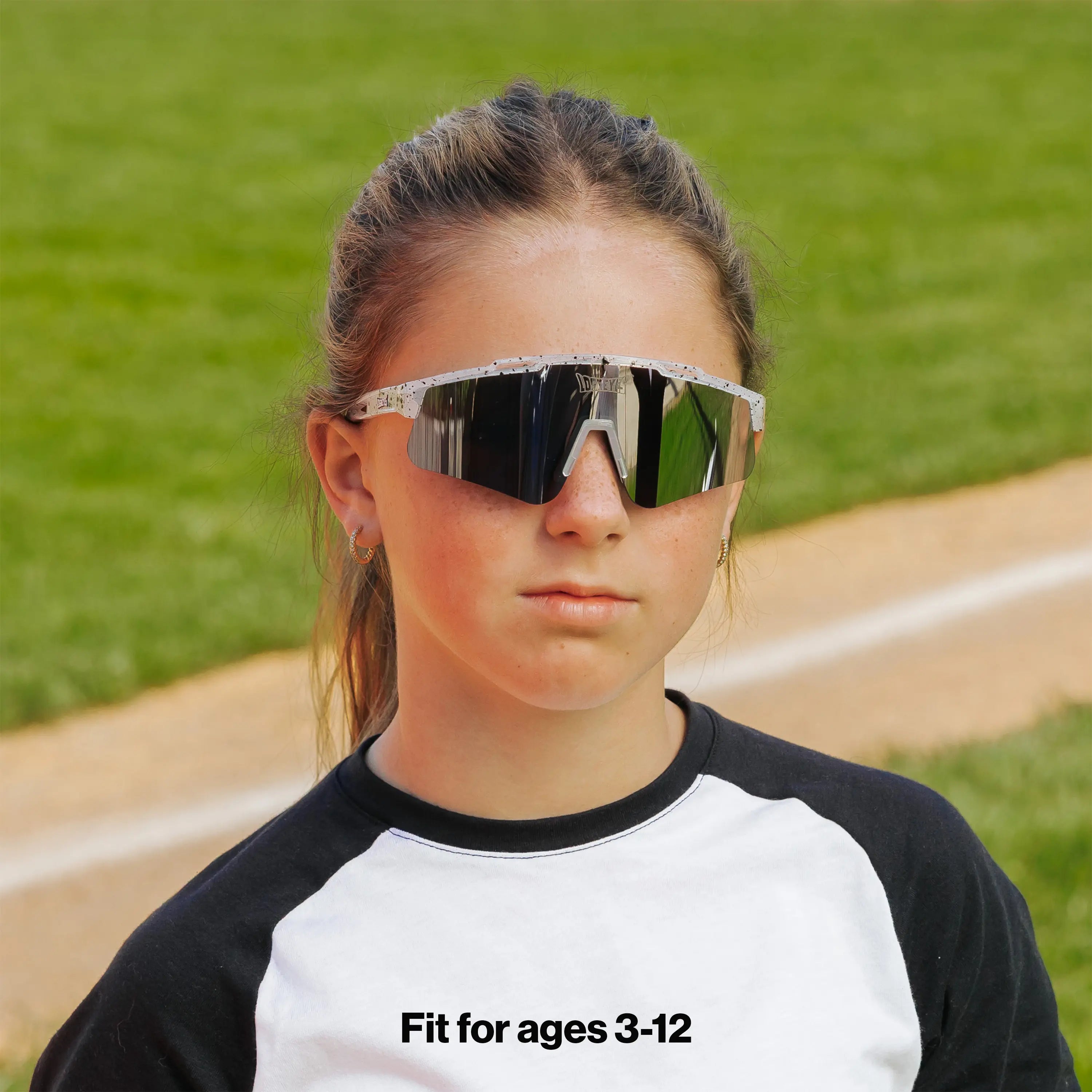 LosReyes PrimeYouth Candy Collection "Cookie" youth sunglasses with UV400 protection on baseball field