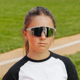 LosReyes PrimeYouth Candy Collection "Cookie" youth sunglasses with UV400 protection on baseball field