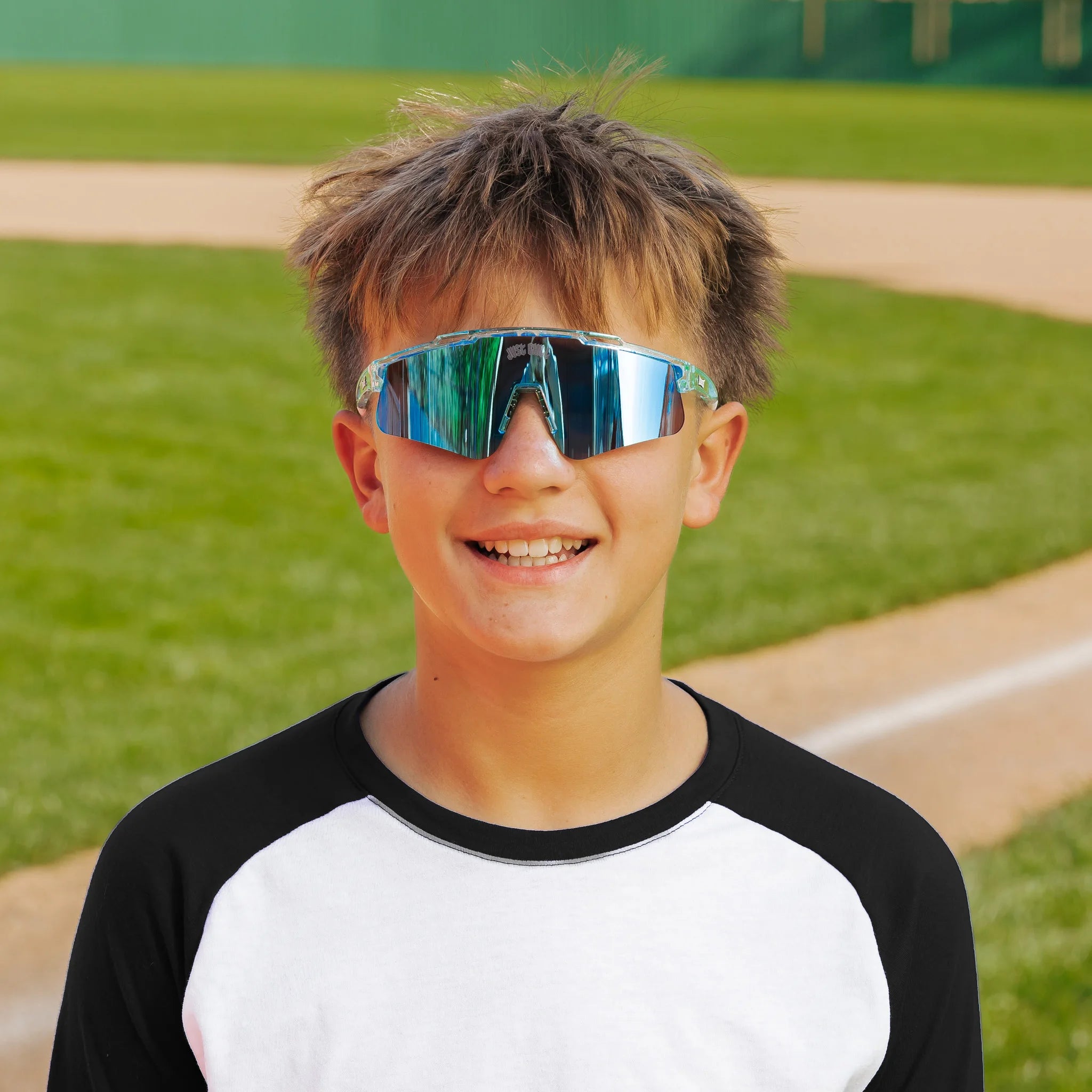LosReyes PrimeYouth Candy Collection "Ice Cube" youth sunglasses with UV400 protection on baseball field