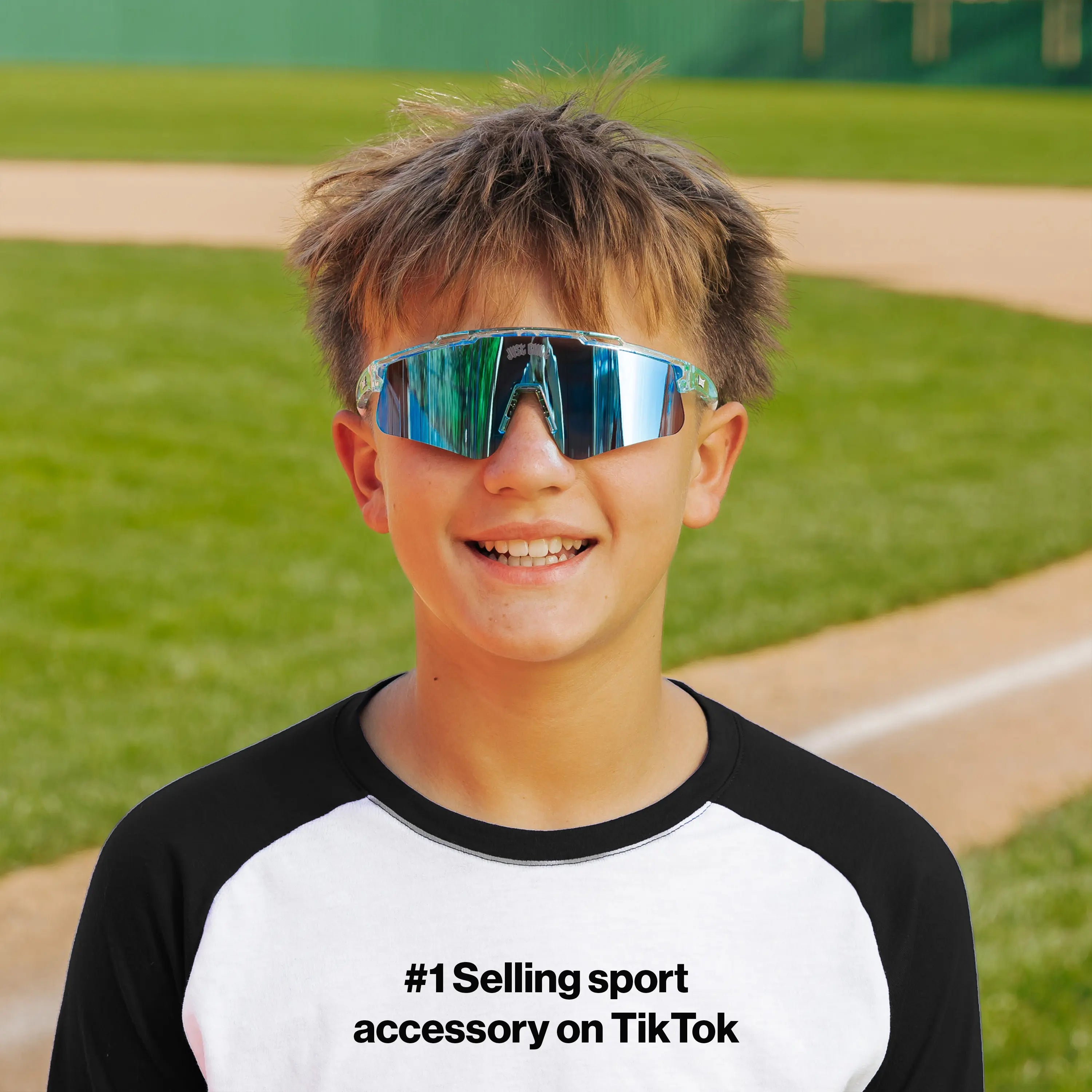 LosReyes PrimeYouth Candy Collection "Ice Cube" youth sunglasses with UV400 protection on baseball field