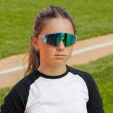 LosReyes PrimeYouth Candy Collection "Ice Cube" youth sunglasses with UV400 protection on baseball field