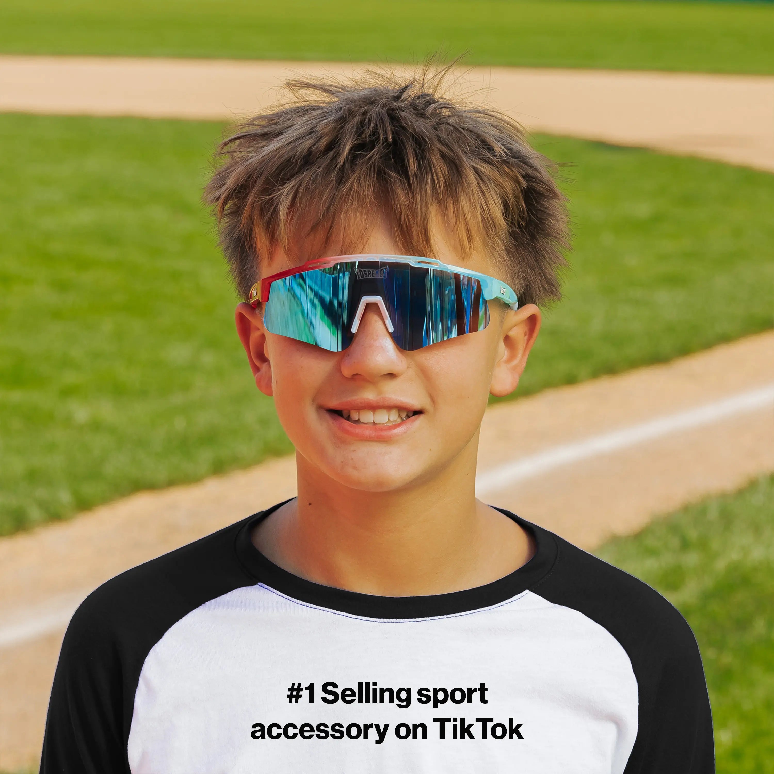 LosReyes PrimeYouth Candy Collection "Rocket Pop" youth sunglasses with UV400 protection on baseball field