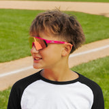 LosReyes PrimeYouth Candy Collection "Strawberry Banana Split" youth sunglasses with UV400 protection on baseball field