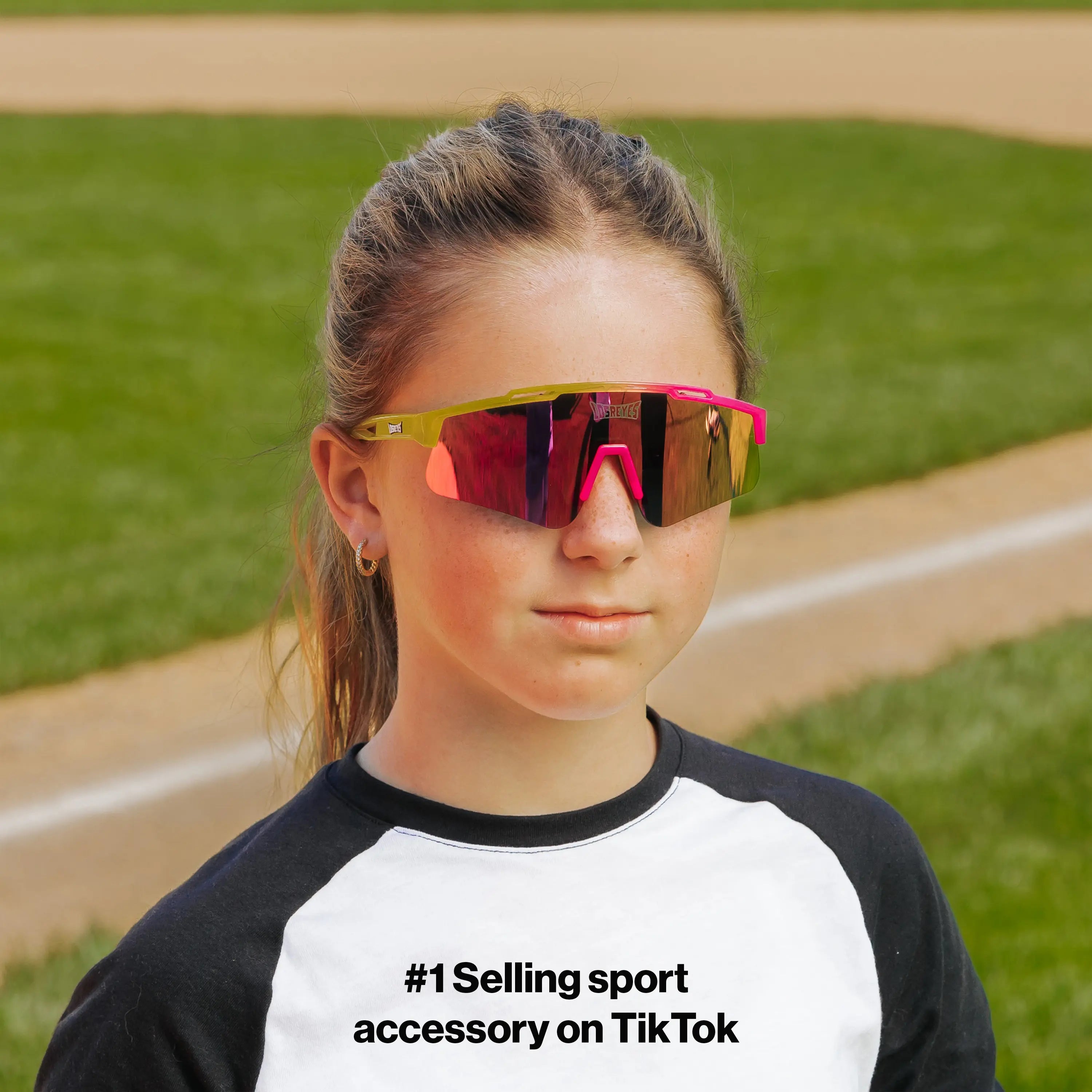 LosReyes PrimeYouth Candy Collection "Strawberry Banana Split" youth sunglasses with UV400 protection on baseball field