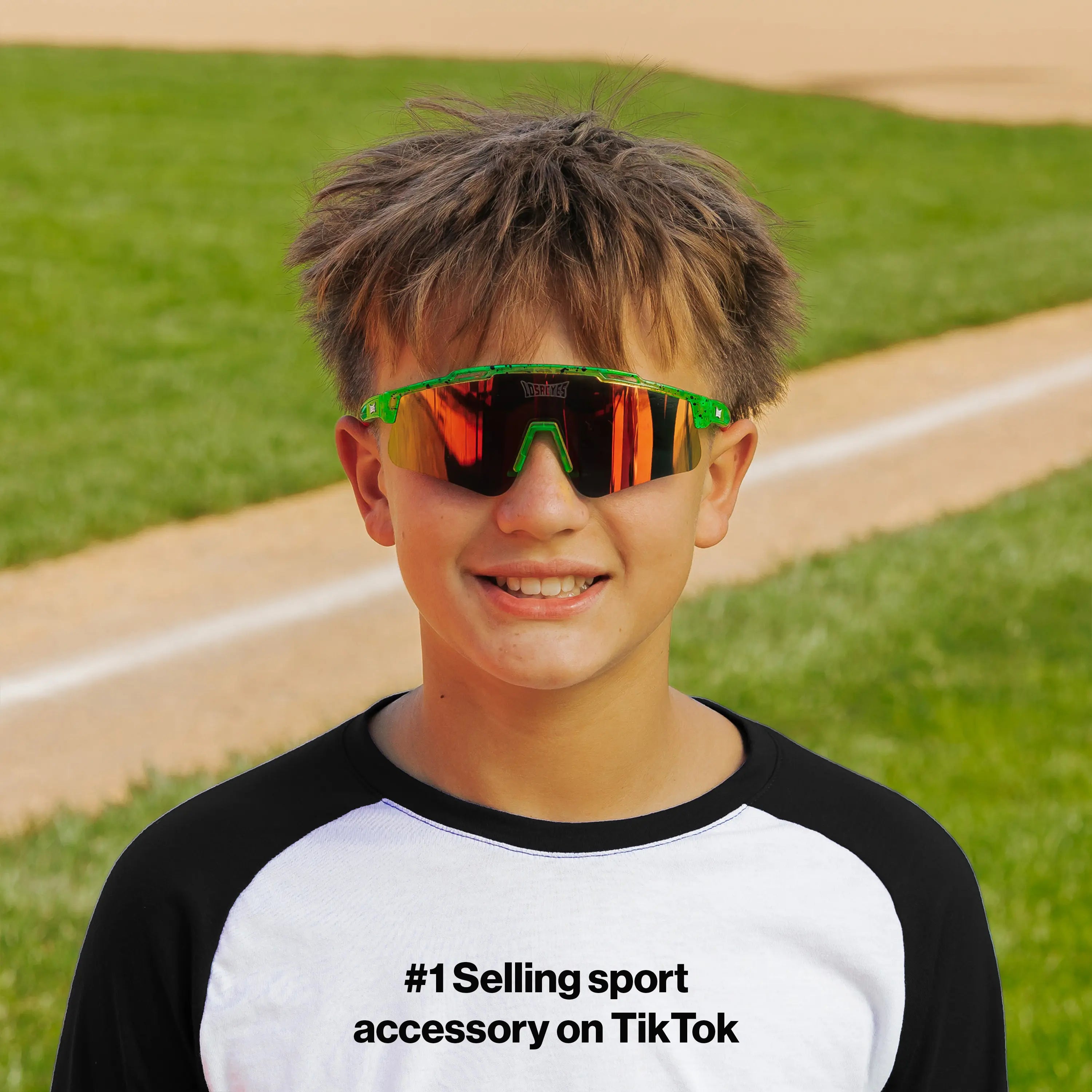 LosReyes PrimeYouth Candy Collection "Watermelon" youth sunglasses with UV400 protection on baseball field