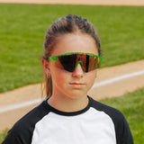 LosReyes PrimeYouth Candy Collection "Watermelon" youth sunglasses with UV400 protection on baseball field