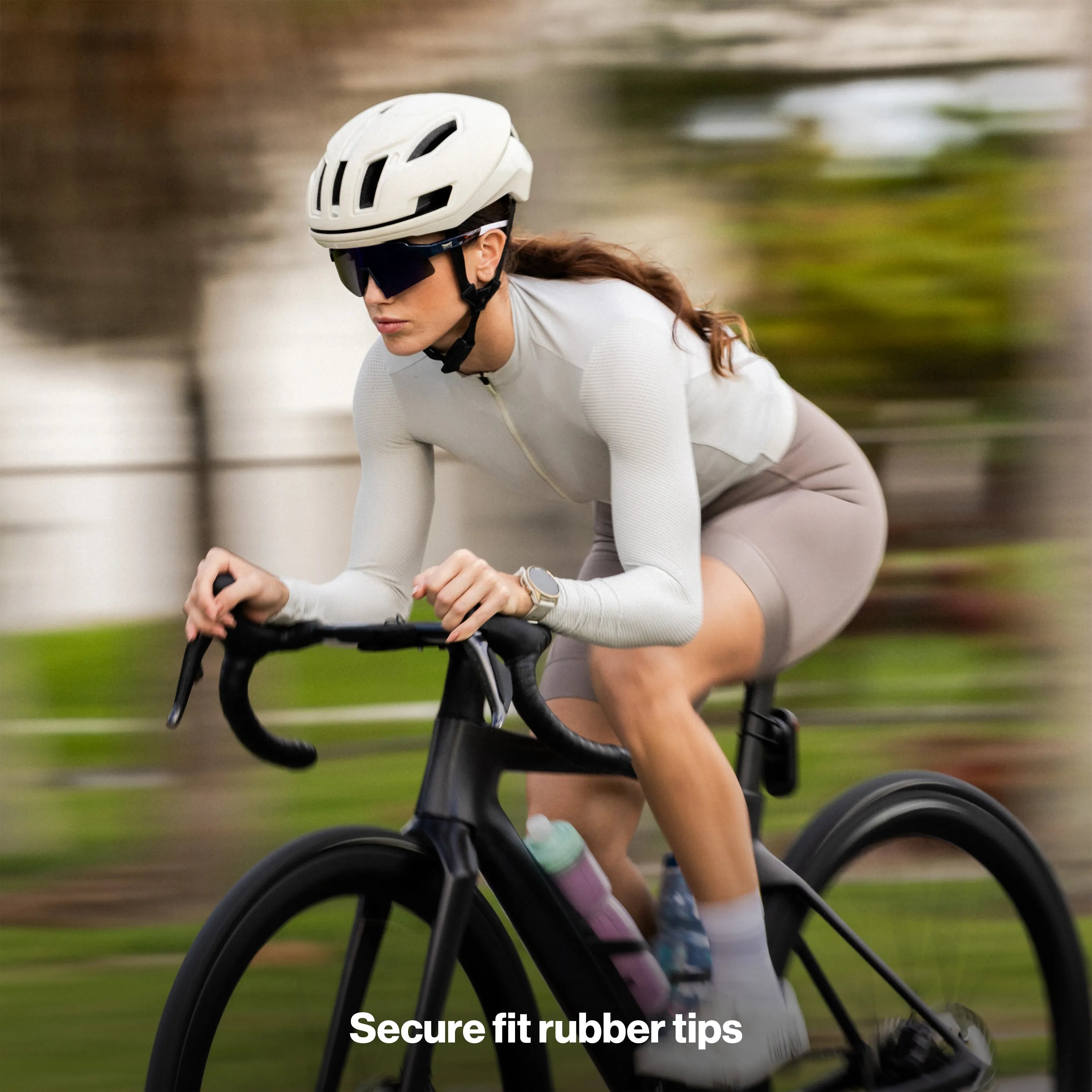 LosReyes SHOWTIME Hurricane performance sunglasses on cyclist riding at speed, lightweight frame with full coverage lenses for road cycling