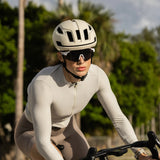 Close-up of LosReyes SHOWTIME Hurricane Reversed sunglasses featuring full-coverage dark lens and reversed white frame for road cycling