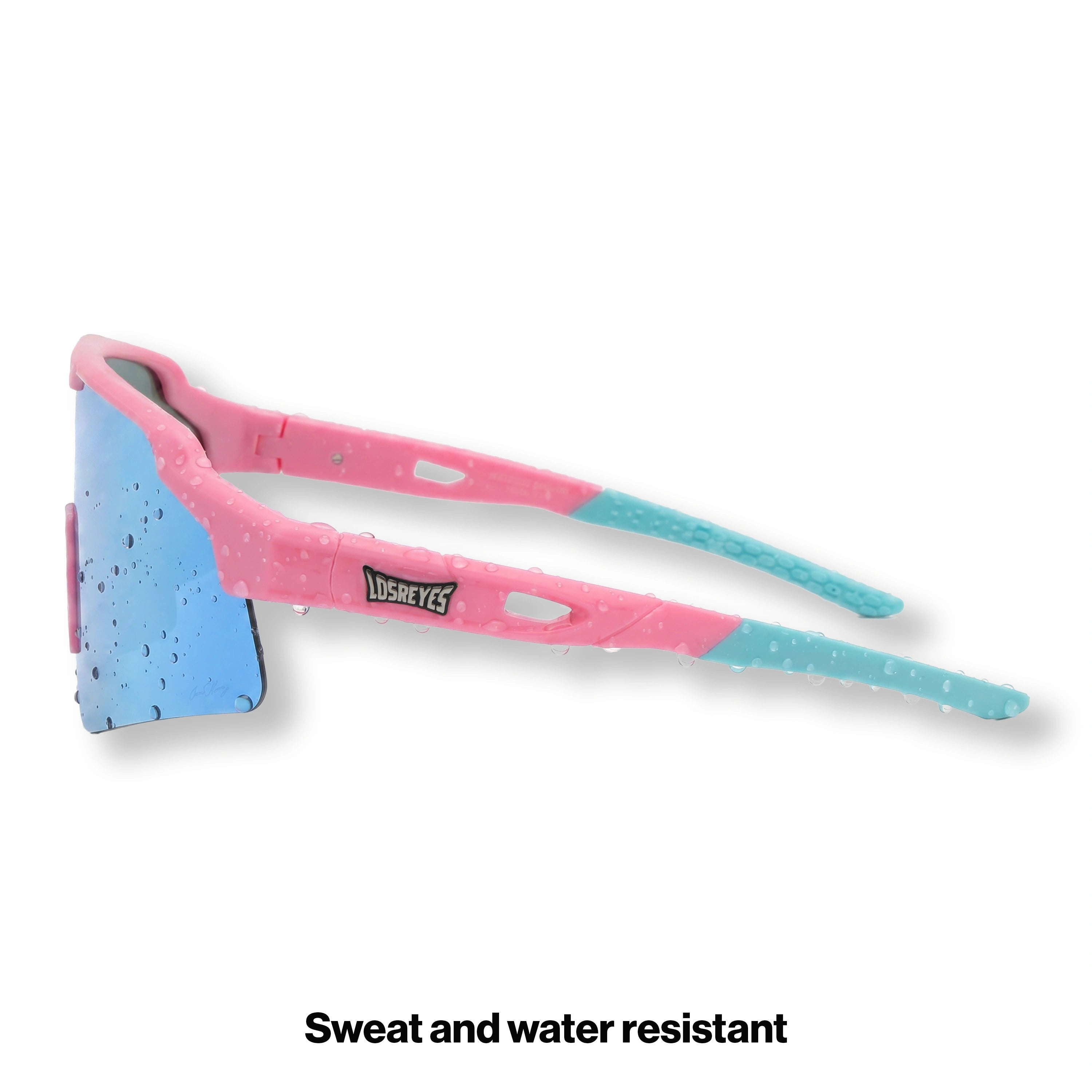 Side view of LosReyes Showtime Vice pink and blue sports sunglasses showing wide peripheral lens coverage, laser-cut ventilation, and rubberized performance temple arms.