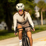 LosReyes SHOWTIME Vice Reversed performance sunglasses worn by cyclist riding head-on, full-coverage mirrored lens for road cycling