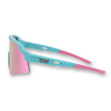 Side view of LosReyes Showtime Vice Reversed sunglasses in signature pink and teal colorway with mirrored shield lens and flexible arms for sport-ready comfort and style.